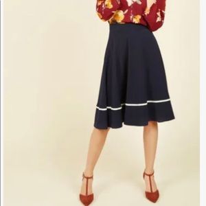 Streak of success navy midi skirt